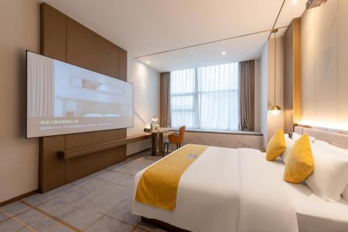 Imagen de la habitación del Hotel Poltton International Service Apartments - Zhuhai Gongbei Port Fuhuali. Foto 16
