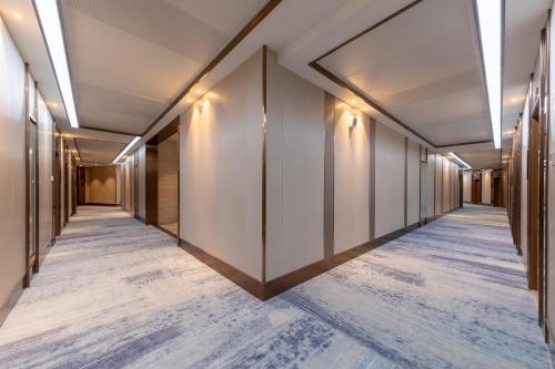 Imagen general del Hotel Poltton International Service Apartments - Zhuhai Gongbei Port Fuhuali. Foto 12