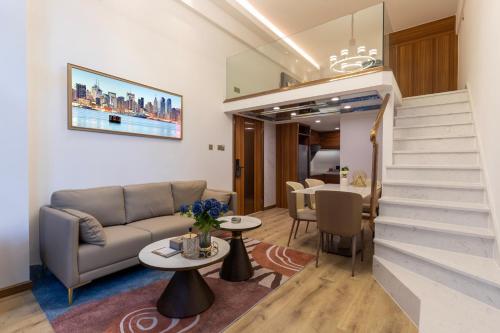 Imagen de la habitación del Hotel Poltton International Service Apartments - Zhuhai Gongbei Port Fuhuali. Foto 19