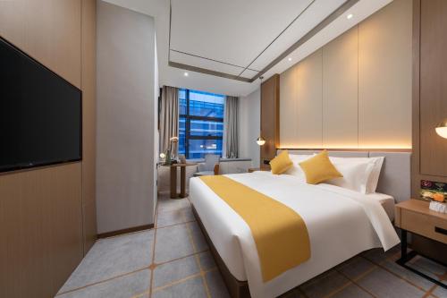 Imagen de la habitación del Hotel Poltton International Service Apartments - Zhuhai Gongbei Port Fuhuali. Foto 20