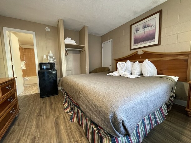 Imagen de la habitación del Hotel Polynesian Beach And Golf Resort. Foto 12