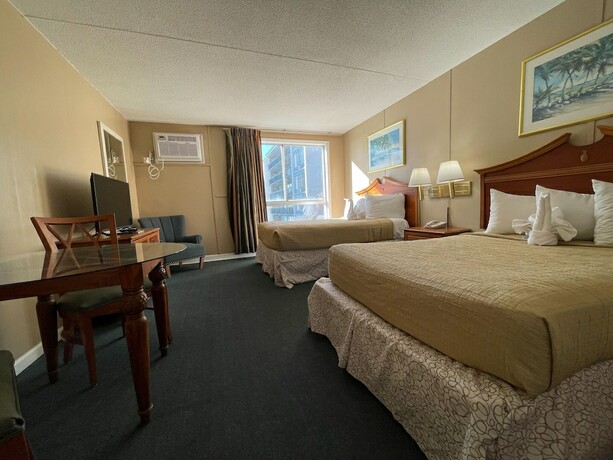 Imagen de la habitación del Hotel Polynesian Beach And Golf Resort. Foto 16