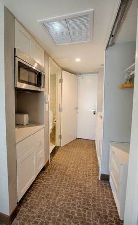 Imagen de la habitación del Hotel Polynesian Residences Waikiki Beach. Foto 10