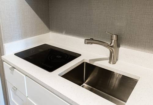 Imagen de la habitación del Hotel Polynesian Residences Waikiki Beach. Foto 14