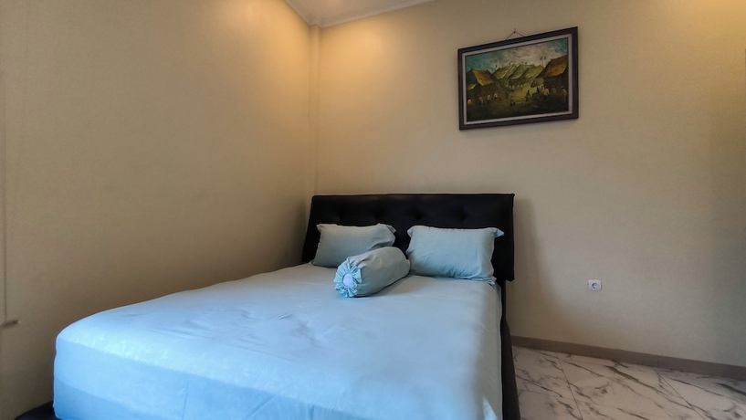 Imagen de la habitación del Hotel Pomah Guesthouse. Foto 2