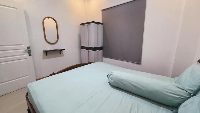 Imagen de la habitación del Hotel Pomah Guesthouse. Foto 4