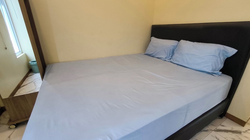 Imagen de la habitación del Hotel Pomah Guesthouse. Foto 7