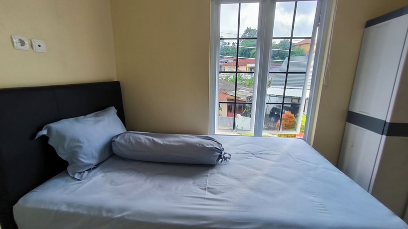 Imagen de la habitación del Hotel Pomah Guesthouse. Foto 10