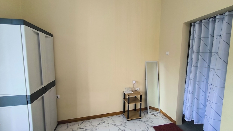 Imagen de la habitación del Hotel Pomah Guesthouse. Foto 12