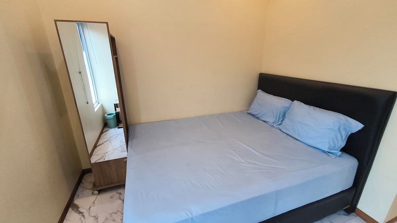 Imagen de la habitación del Hotel Pomah Guesthouse. Foto 14