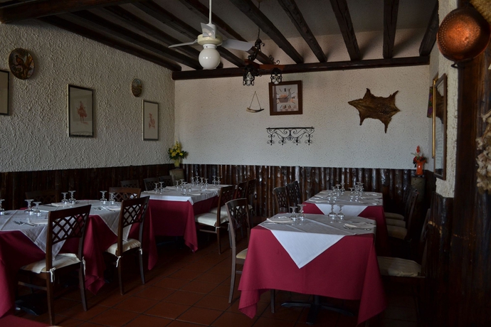 Imagen del bar/restaurante del Hotel Pomara. Foto 1