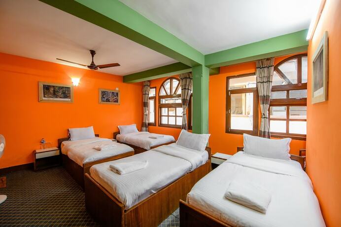 Imagen de la habitación del Hotel Pomelo House. Foto 13