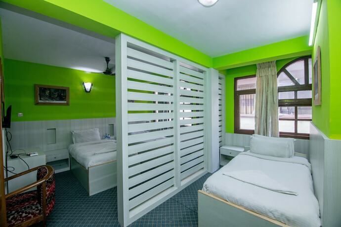 Imagen de la habitación del Hotel Pomelo House. Foto 14