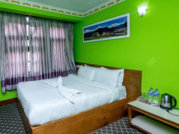 Imagen de la habitación del Hotel Pomelo House. Foto 17