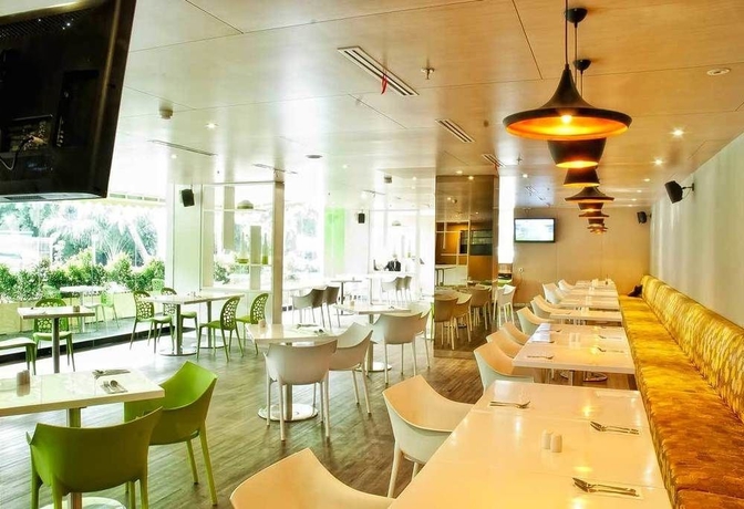 Imagen del bar/restaurante del Hotel Pomelotel Patra Kuningan Jakarta. Foto 2