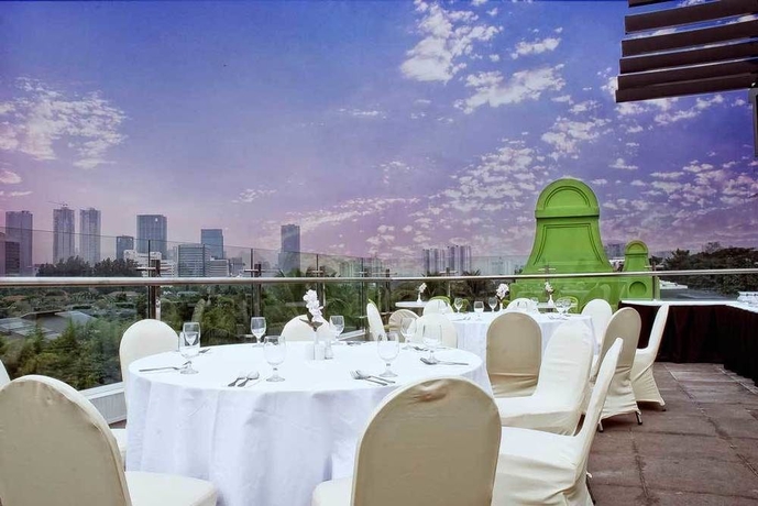 Imagen del bar/restaurante del Hotel Pomelotel Patra Kuningan Jakarta. Foto 4