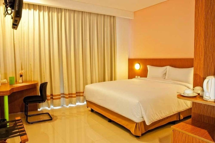 Imagen de la habitación del Hotel Pomelotel Patra Kuningan Jakarta. Foto 8