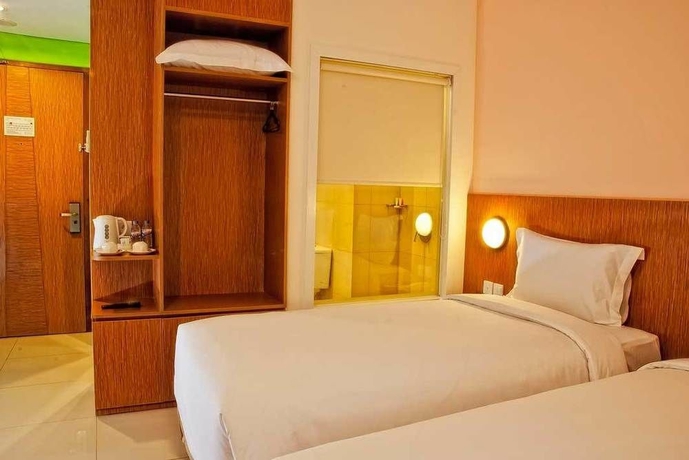 Imagen de la habitación del Hotel Pomelotel Patra Kuningan Jakarta. Foto 9