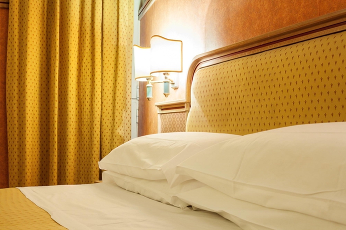 Imagen de la habitación del Hotel Pomezia. Foto 11