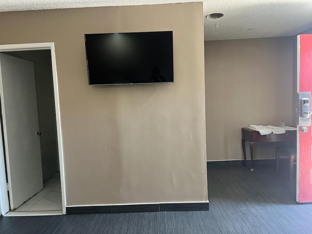 Imagen de la habitación del Hotel Pomona Inn. Foto 6
