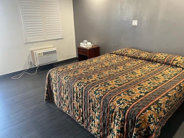 Imagen de la habitación del Hotel Pomona Inn. Foto 9
