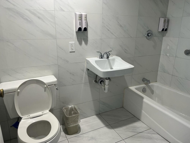 Imagen de la habitación del Hotel Pomona Inn. Foto 11