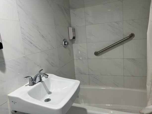 Imagen de la habitación del Hotel Pomona Inn. Foto 12
