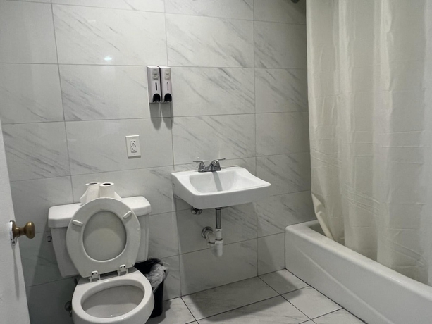 Imagen de la habitación del Hotel Pomona Inn. Foto 13