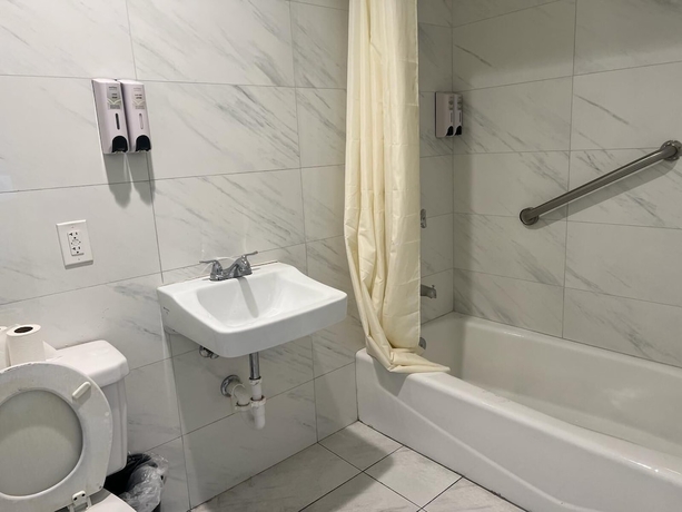 Imagen de la habitación del Hotel Pomona Inn. Foto 14