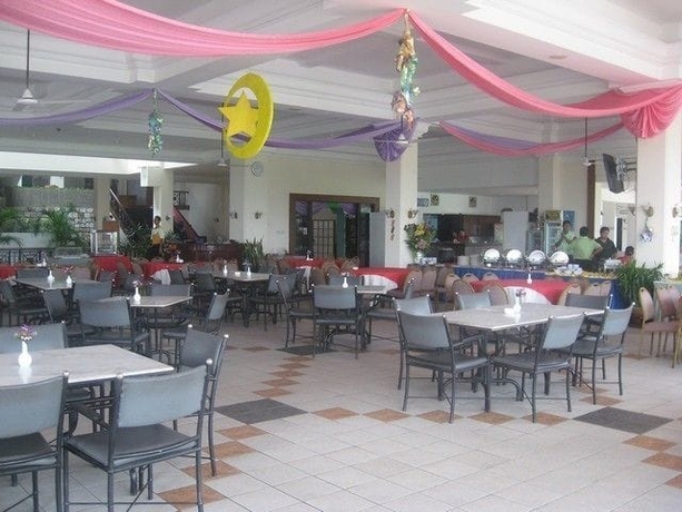Imagen del bar/restaurante del Hotel Ponderosa Golf and Country Resort. Foto 8