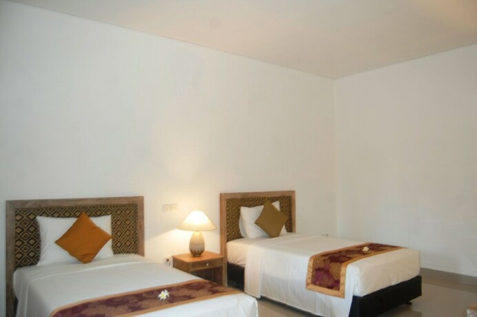 Imagen de la habitación del Hotel Pondok Alit Resort. Foto 15