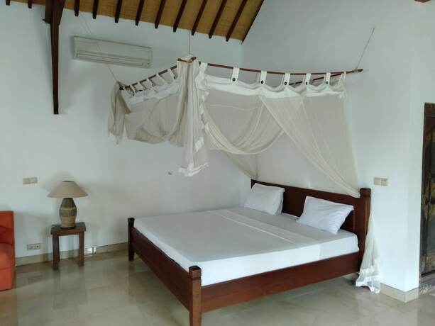 Imagen de la habitación del Hotel Pondok Alit Resort. Foto 19