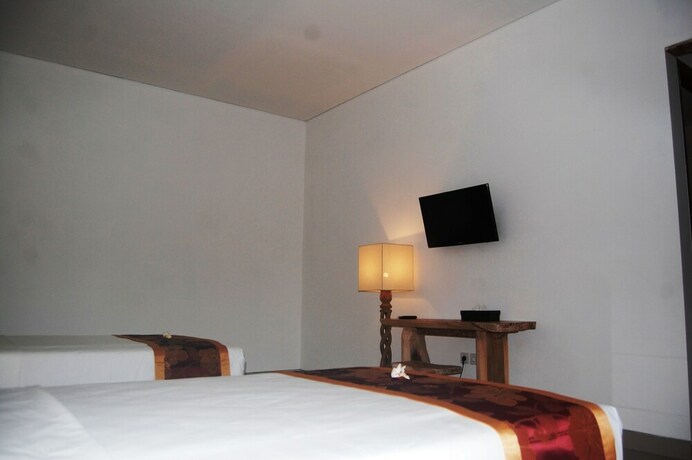 Imagen de la habitación del Hotel Pondok Alit Resort. Foto 21