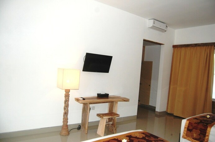Imagen de la habitación del Hotel Pondok Alit Resort. Foto 22