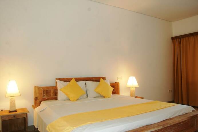 Imagen de la habitación del Hotel Pondok Alit Resort. Foto 26