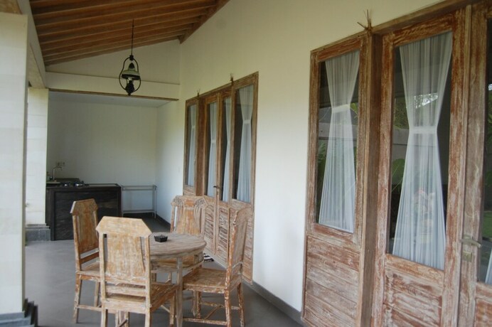 Imagen de la habitación del Hotel Pondok Alit Resort. Foto 32