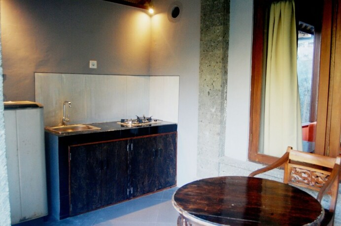 Imagen de la habitación del Hotel Pondok Alit Resort. Foto 33