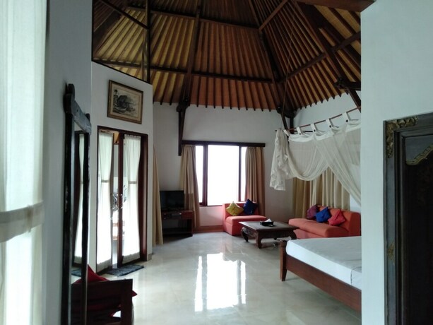 Imagen de la habitación del Hotel Pondok Alit Resort. Foto 34