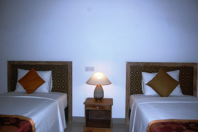 Imagen de la habitación del Hotel Pondok Alit Resort. Foto 35