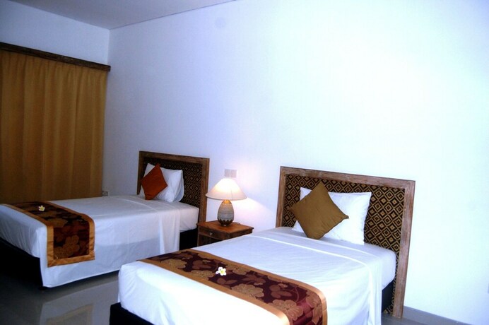 Imagen de la habitación del Hotel Pondok Alit Resort. Foto 37