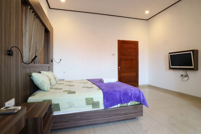 Imagen de la habitación del Hotel Pondok Hasan. Foto 6
