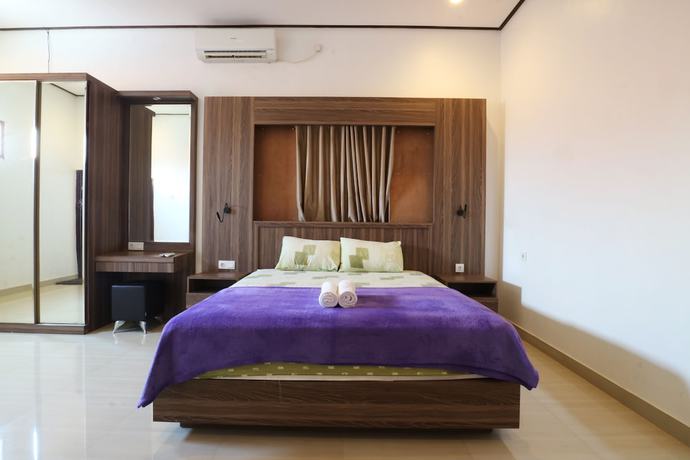 Imagen de la habitación del Hotel Pondok Hasan. Foto 7