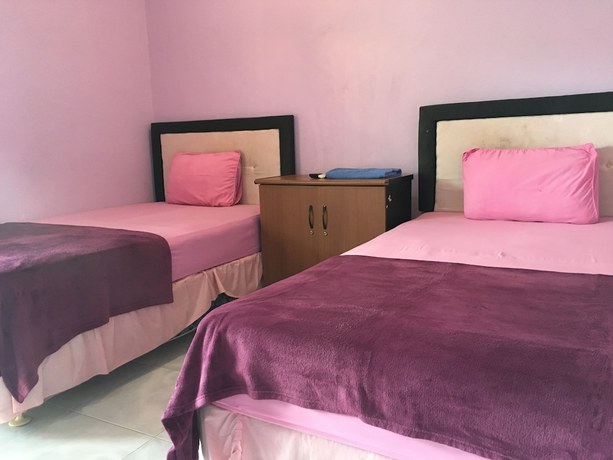 Imagen de la habitación del Hotel Pondok Hasan. Foto 15