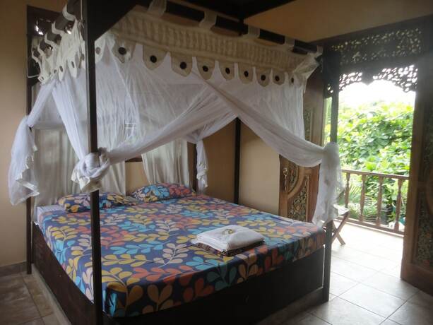 Imagen de la habitación del Hotel Pondok Indah Bungalow Bingin. Foto 19