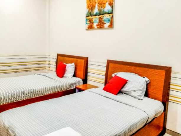 Imagen de la habitación del Hotel Pondok Indah Homestay by ecommerceloka. Foto 13