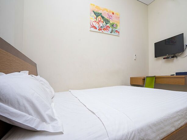 Imagen de la habitación del Hotel Pondok Indah Homestay by ecommerceloka. Foto 19