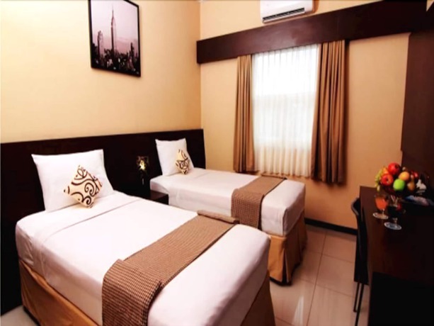Imagen de la habitación del Hotel Pondok Keluarga Osamaliki. Foto 10