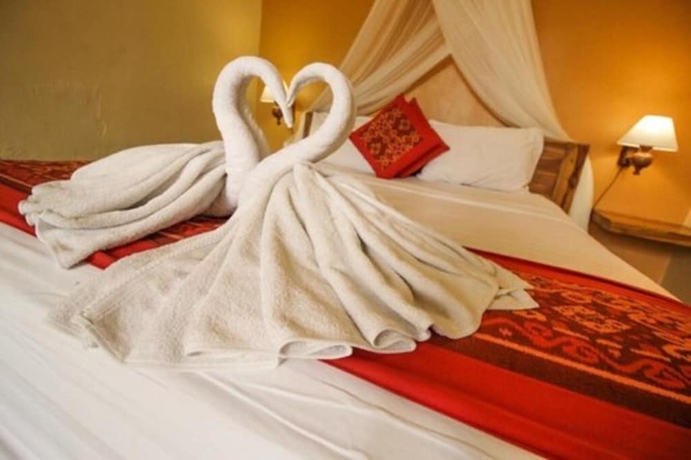 Imagen de la habitación del Hotel Pondok Kutuh Guesthouse. Foto 1