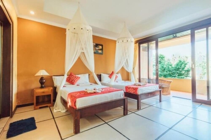 Imagen de la habitación del Hotel Pondok Kutuh Guesthouse. Foto 6