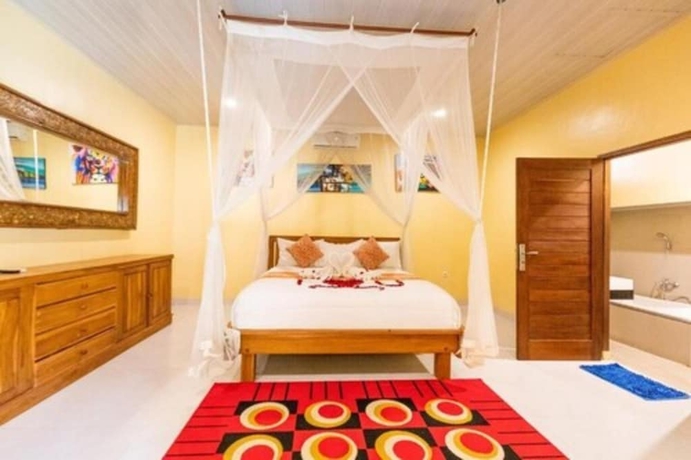 Imagen de la habitación del Hotel Pondok Kutuh Guesthouse. Foto 7
